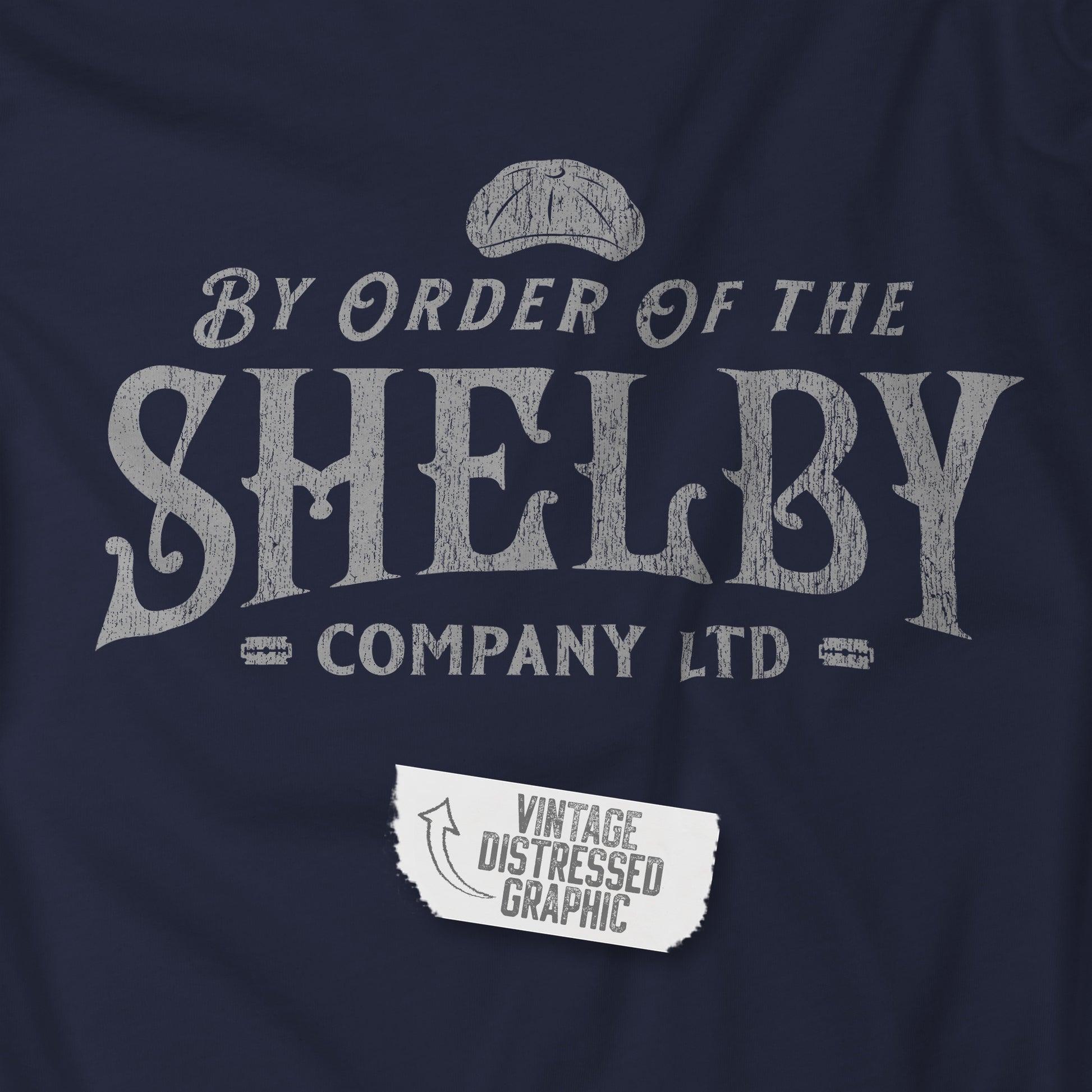 Closeup view of a Shelby Company Ltd vintage distressed logo graphic from Peaky Blinders, featuring flat cap and razor blades.