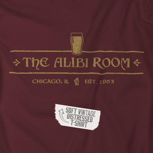 Closeup of t-shirt featuring The Alibi Room logo graphic inspired by the TV show Shameless in a vintage distressed style.