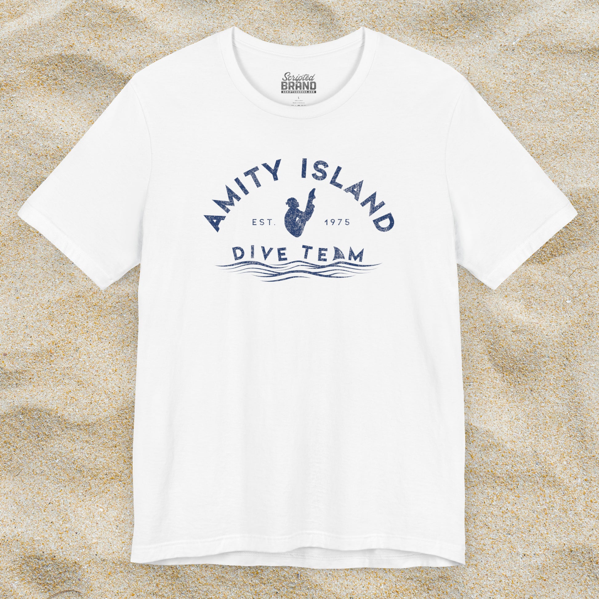 Front view of white Bella+Canvas t-shirt with vintage-style Amity Island Dive Team logo, inspired by the movie Jaws.