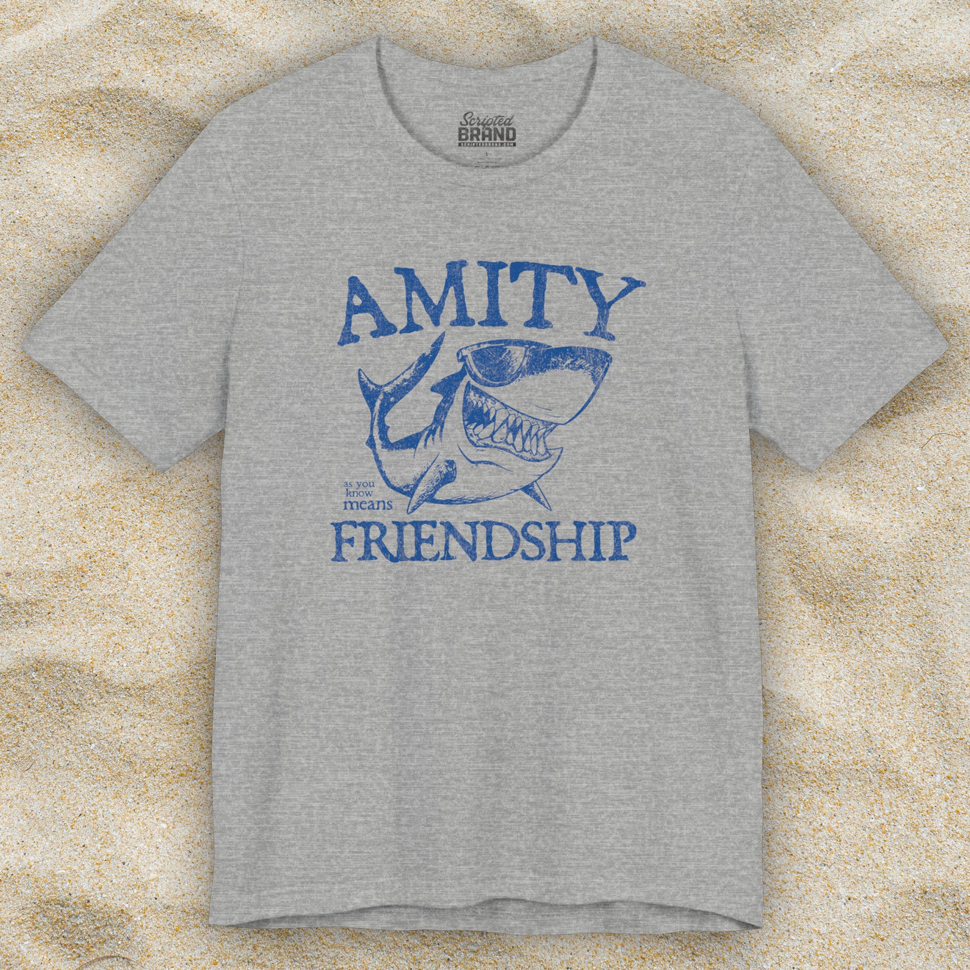 Athletic heather grey Bella+Canvas t-shirt with a vintage-style Amity Island “Friendship” shark graphic inspired by the movie Jaws