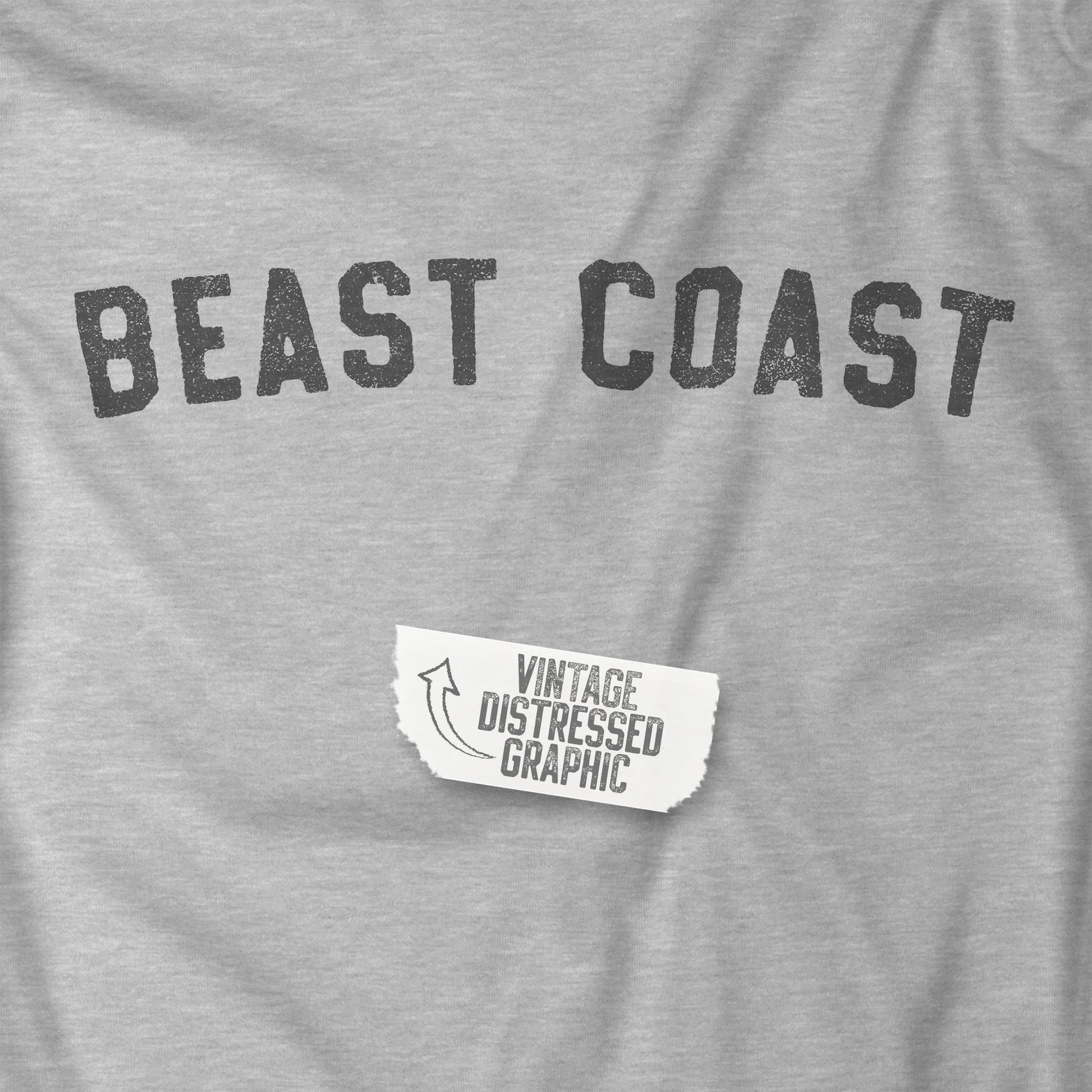 Closeup of Athletic Heather t-shirt with vintage BEAST COAST text inspired by Mac from It’s Always Sunny in Philadelphia.