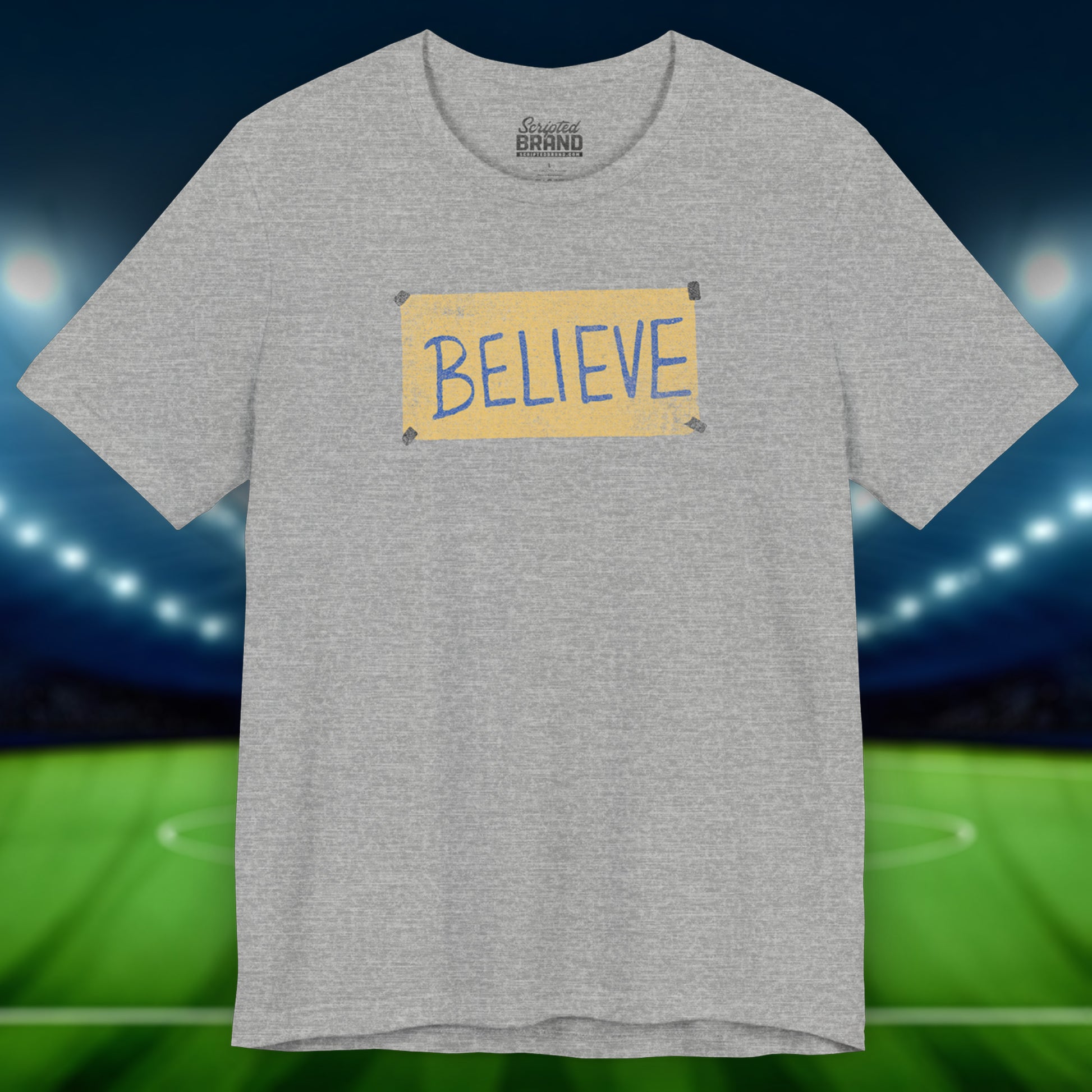 Front view of an athletic heather grey colored soft Bella+Canvas 3001 short-sleeve t-shirt featuring a logo graphic of the BELIEVE sign Ted Lasso hung in the fictional English soccer team AFC Richmond locker room, inspired by the TV show Ted Lasso in a vintage distressed style, sold by ScriptedBrand.