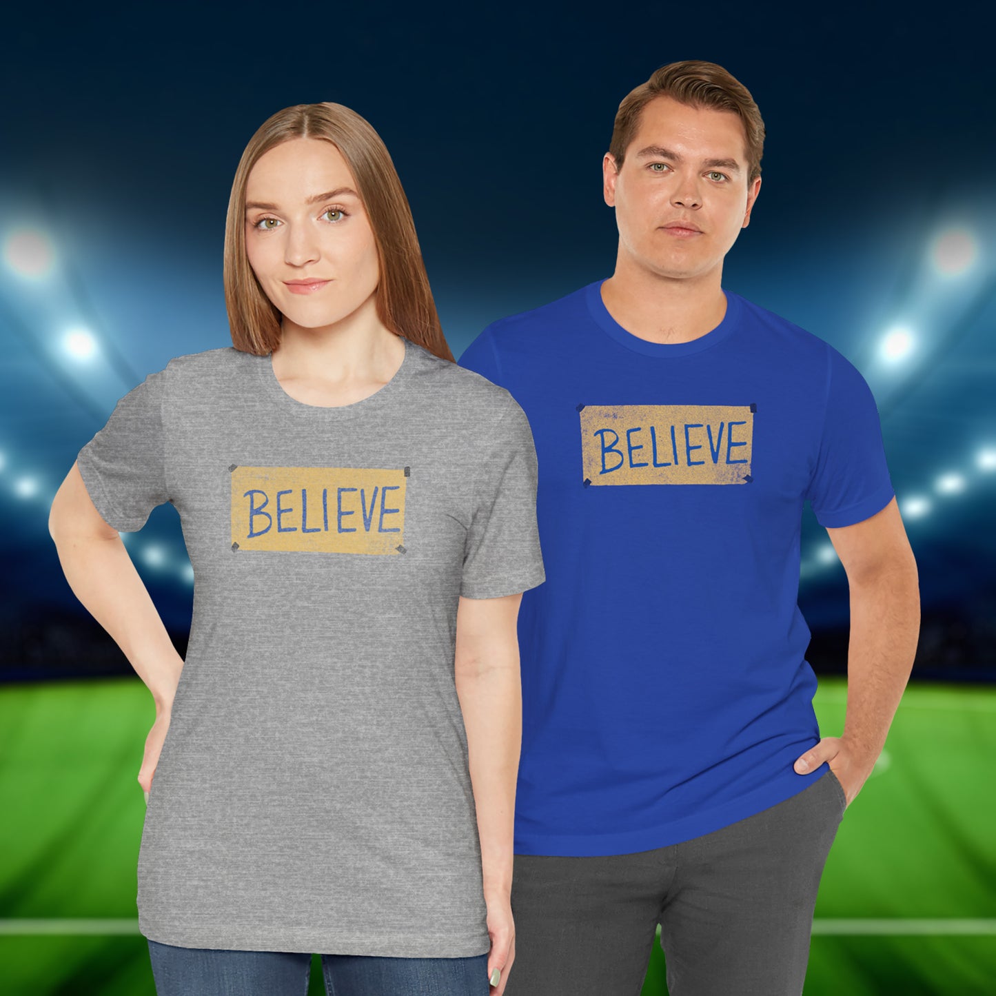 2 models wearing grey and blue soft Bella+Canvas 3001 short-sleeve t-shirts featuring a logo graphic of the BELIEVE sign Ted Lasso hung in the fictional English soccer team AFC Richmond locker room, inspired by the TV show Ted Lasso in a vintage distressed style, sold by ScriptedBrand.