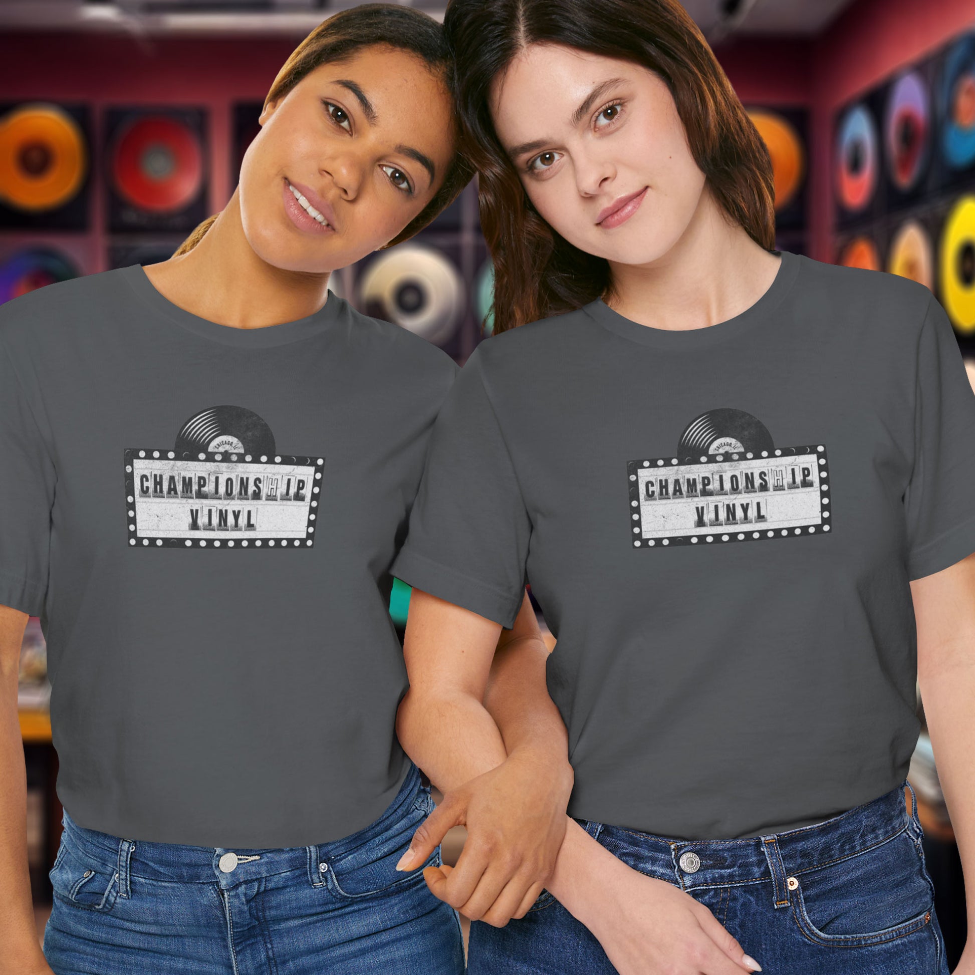 2 female models wearing t-shirts featuring the fictional logo CHAMPIONSHIP VINYL record store from movie High Fidelity in a vintage distressed style.