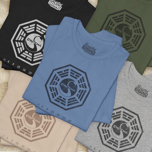 Group of 5 folded short-sleeve t-shirts featuring the Dharma Initiative swan station logo graphic from the TV show LOST in a vintage distressed style.