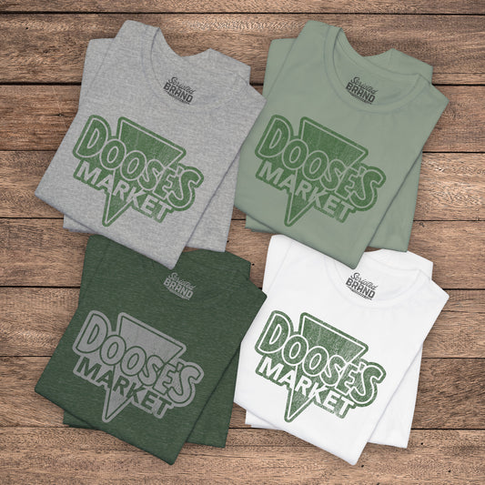 4 folded Bella+Canvas t-shirts with a vintage-style Doose’s Market logo graphic, inspired by Gilmore Girls