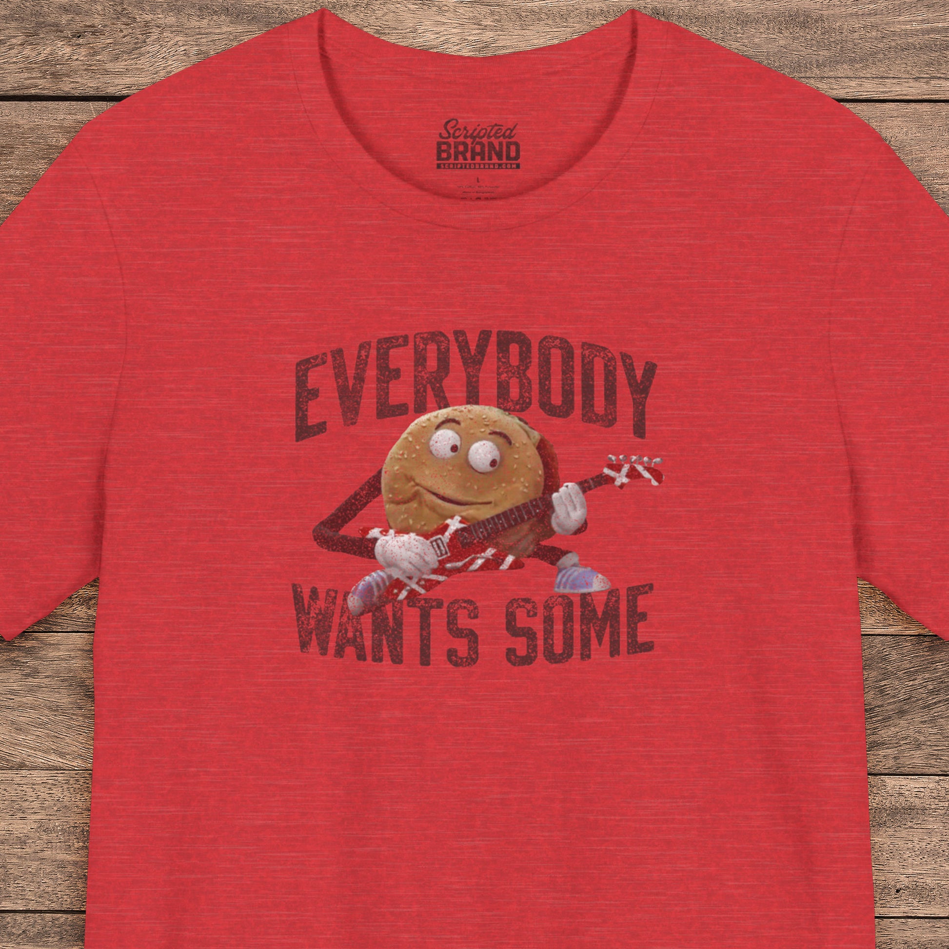 Red t-shirt with the phrase EVERYBODY WANTS SOME and a graphic of the guitar playing hamburger from the movie Better Off Dead in a vintage style.