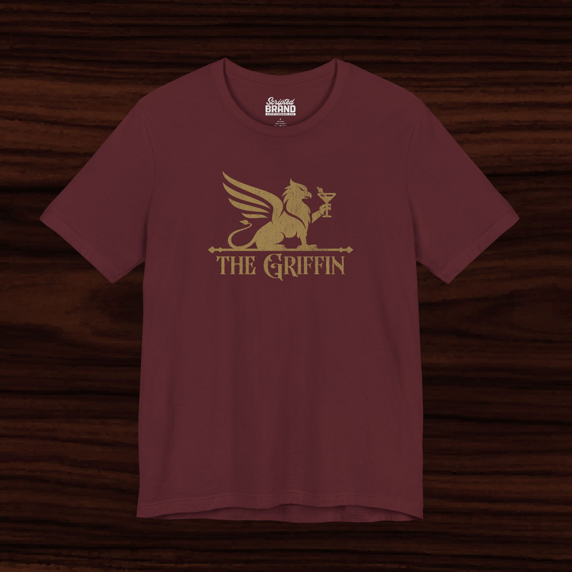 Maroon t-shirt featuring gold 'The Griffin' Bar logo inspired by the TV show New Girl in a vintage distressed style.
