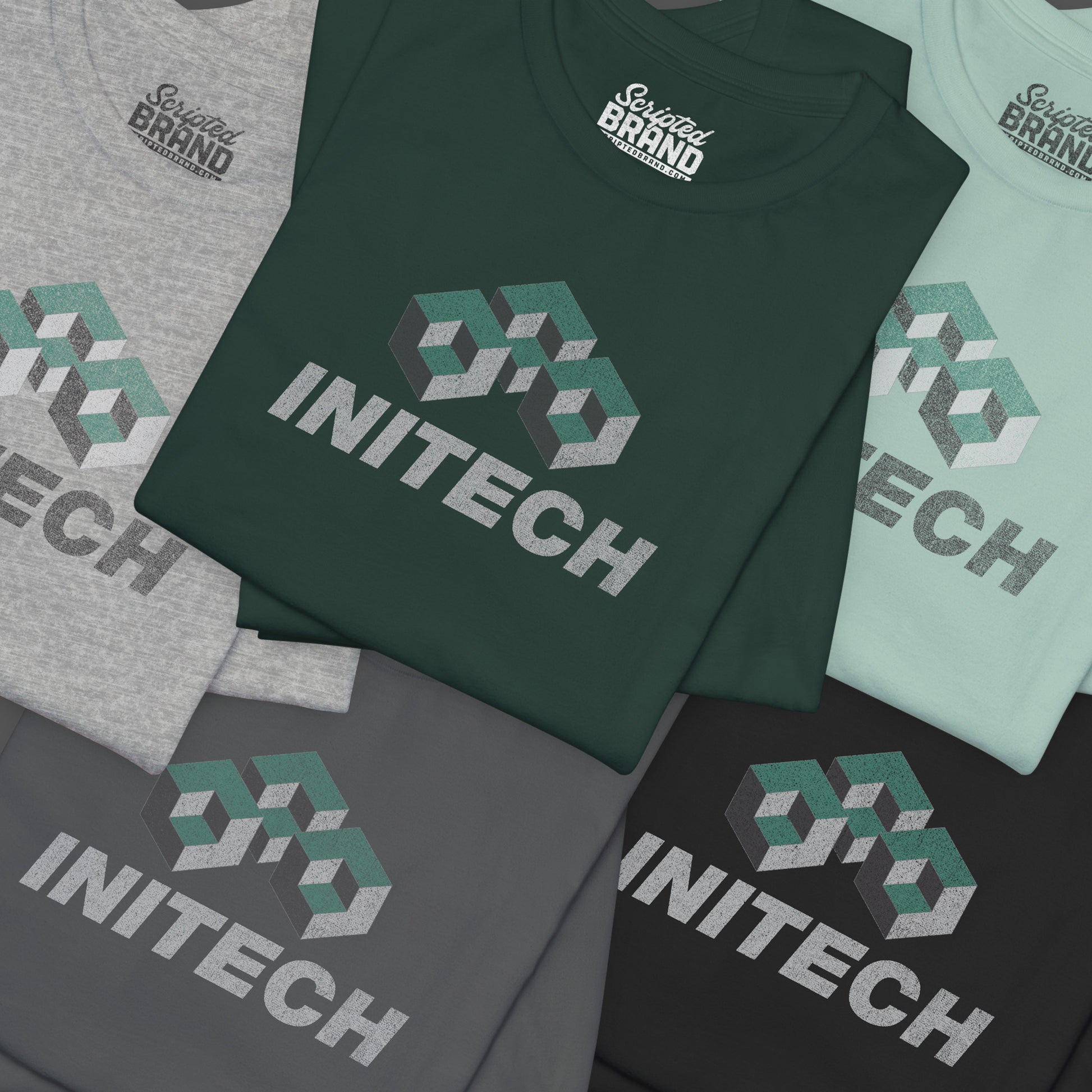 Group of 5 folded soft Bella+Canvas 3001 short-sleeve t-shirts featuring the Initech logo from the movie Office Space in a vintage distressed style, sold by ScriptedBrand.
