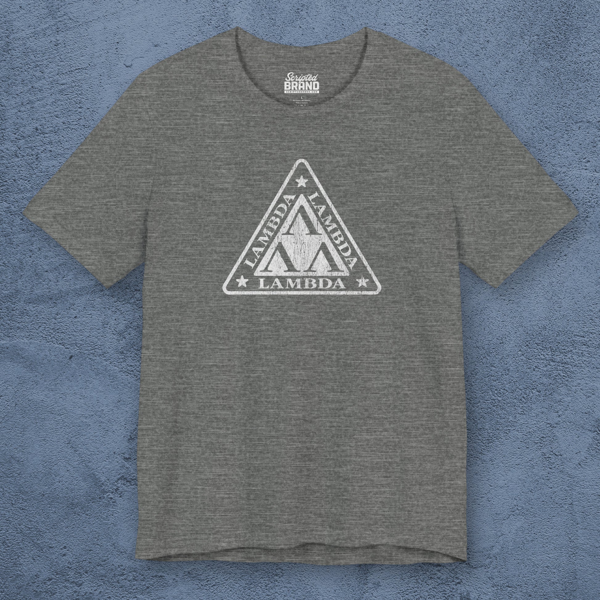Front view of a deep heather colored Tri-Lam soft Bella+Canvas 3001 short-sleeve t-shirt featuring the logo graphic of the fictional fraternity Lambda Lambda Lambda, inspired by the movie Revenge of the Nerds, printed in a vintage distressed style, sold by ScriptedBrand.