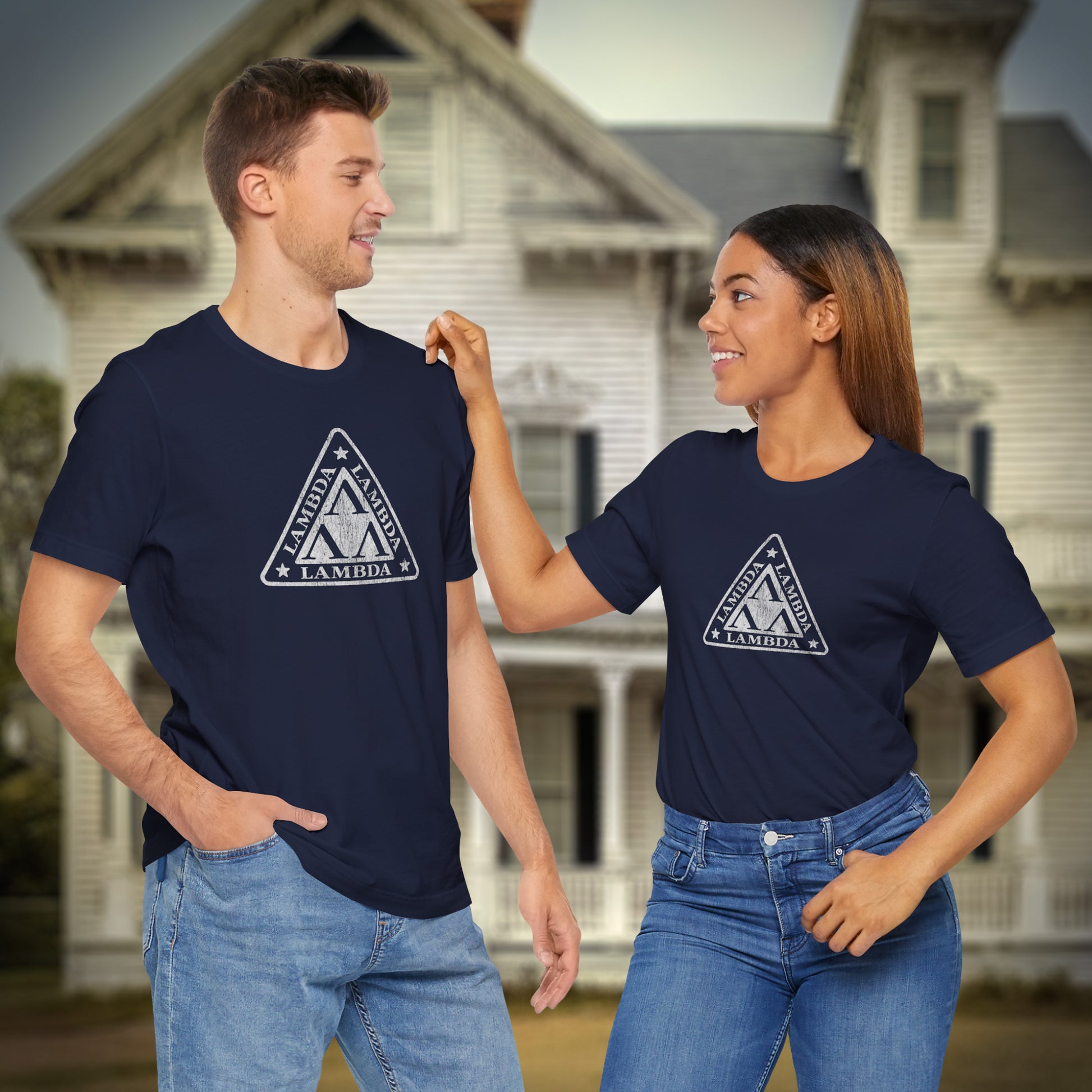 2 models wearing navy blue Tri-Lam soft Bella+Canvas 3001 short-sleeve t-shirts featuring the logo graphic of the fictional fraternity Lambda Lambda Lambda, inspired by the movie Revenge of the Nerds, printed in a vintage distressed style, sold by ScriptedBrand.