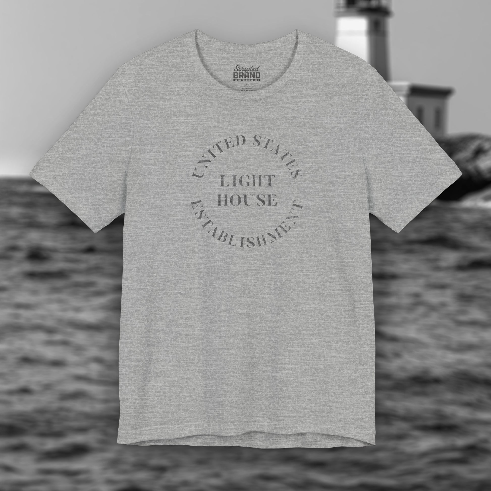 Heather Gray t-shirt featuring the United States Light House Establishment logo graphic worn by Robert Pattinson in the movie The Lighthouse in a vintage distressed style.