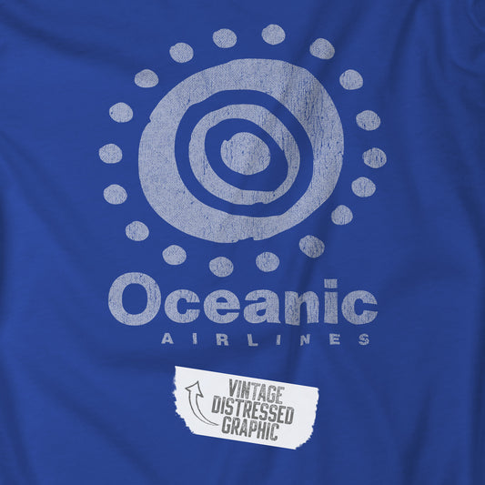 Closeup of Royal blue t-shirt featuring the Oceanic Airlines logo graphic from the TV show LOST in a vintage distressed style.