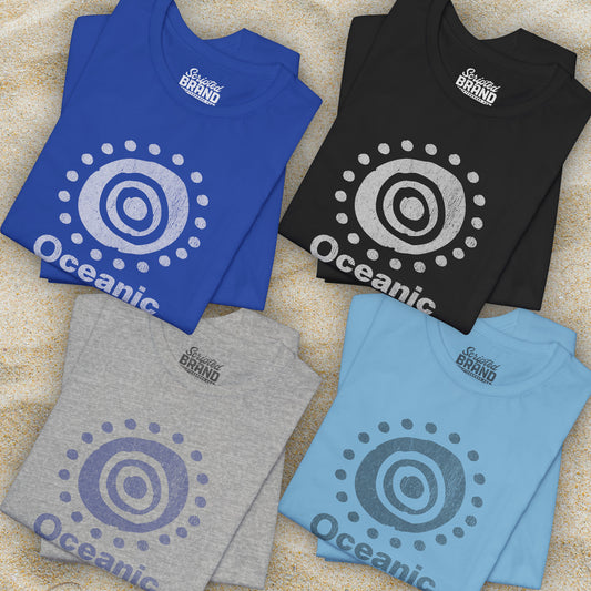 Four folded t-shirts featuring the Oceanic Airlines logo graphic from the TV show LOST in a vintage distressed style.