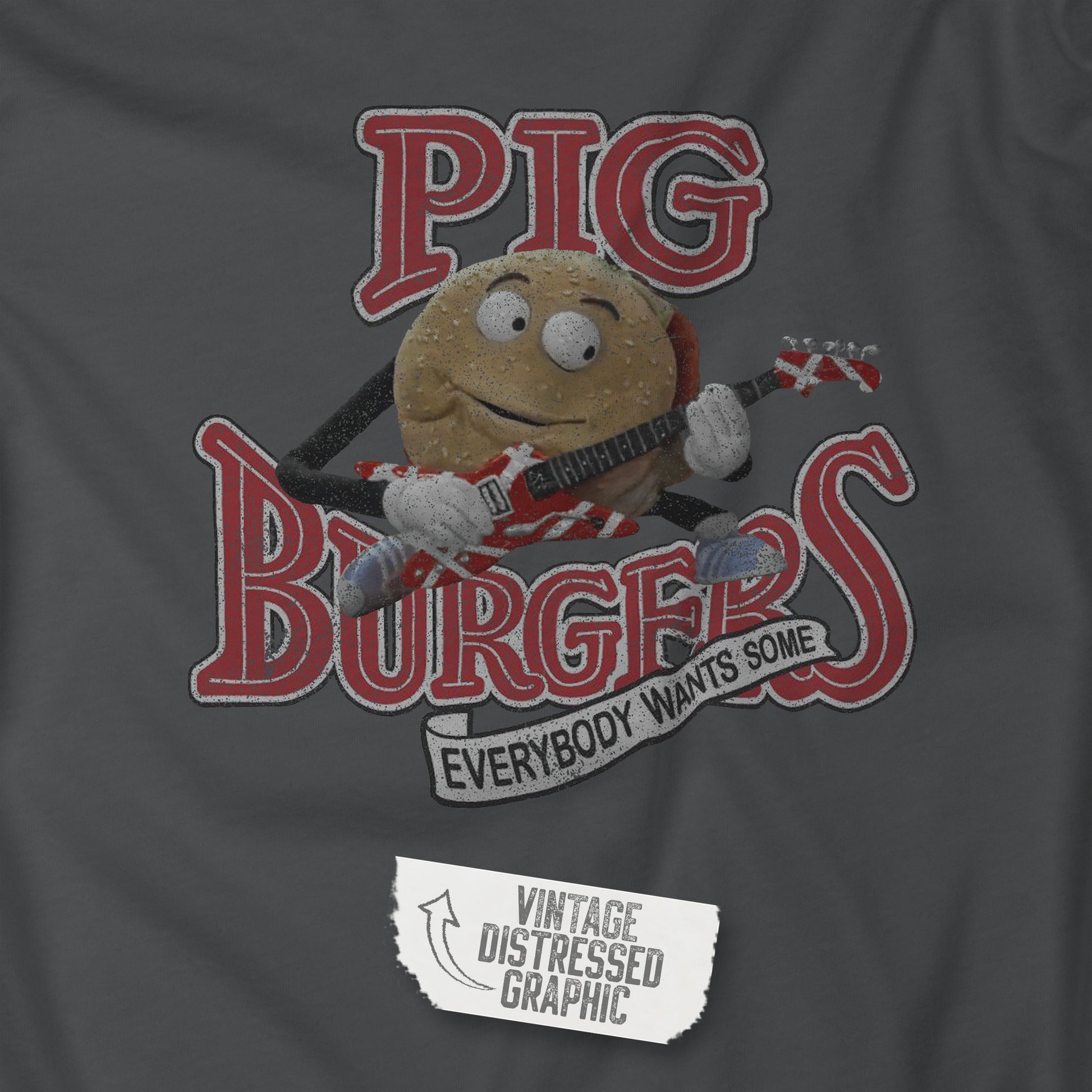 Closeup view of an asphalt grey colored soft Bella+Canvas 3001 short-sleeve t-shirt featuring a graphic of the fictional Pig Burgers logo from the movie Better Off Dead, along with the Van Halen singing hamburger playing guitar, with the small subhead phrase EVERYBODY WANTS SOME. The graphic is designed in a vintage distressed style, sold by ScriptedBrand.