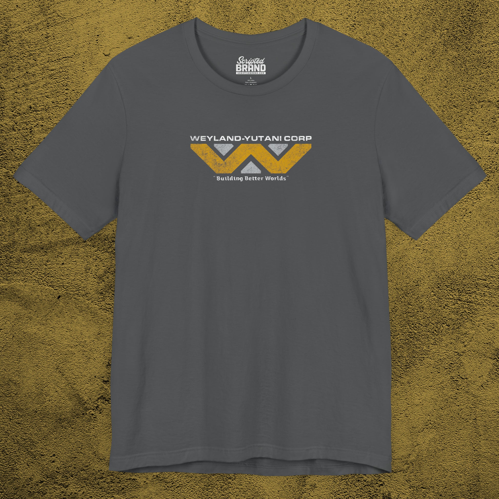 Front view of an asphalt grey colored soft Bella+Canvas 3001 short-sleeve t-shirt tee featuring the Weyland-Yutani logo from the movie Alien and Aliens franchise in a vintage distressed style, sold by ScriptedBrand.