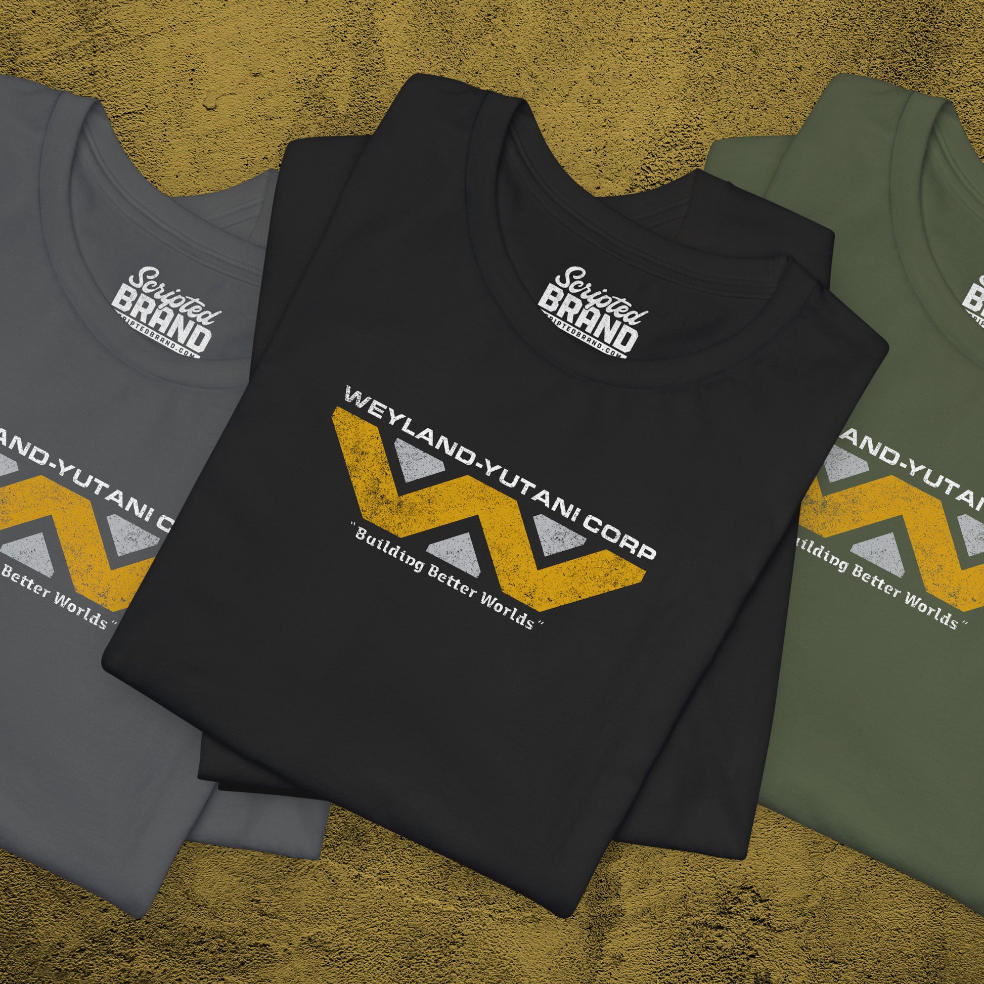 Group of 3 folded soft Bella+Canvas 3001 short-sleeve tee t-shirts featuring the Weyland-Yutani logo from the movie Alien and Aliens franchise in a vintage distressed style, sold by ScriptedBrand.