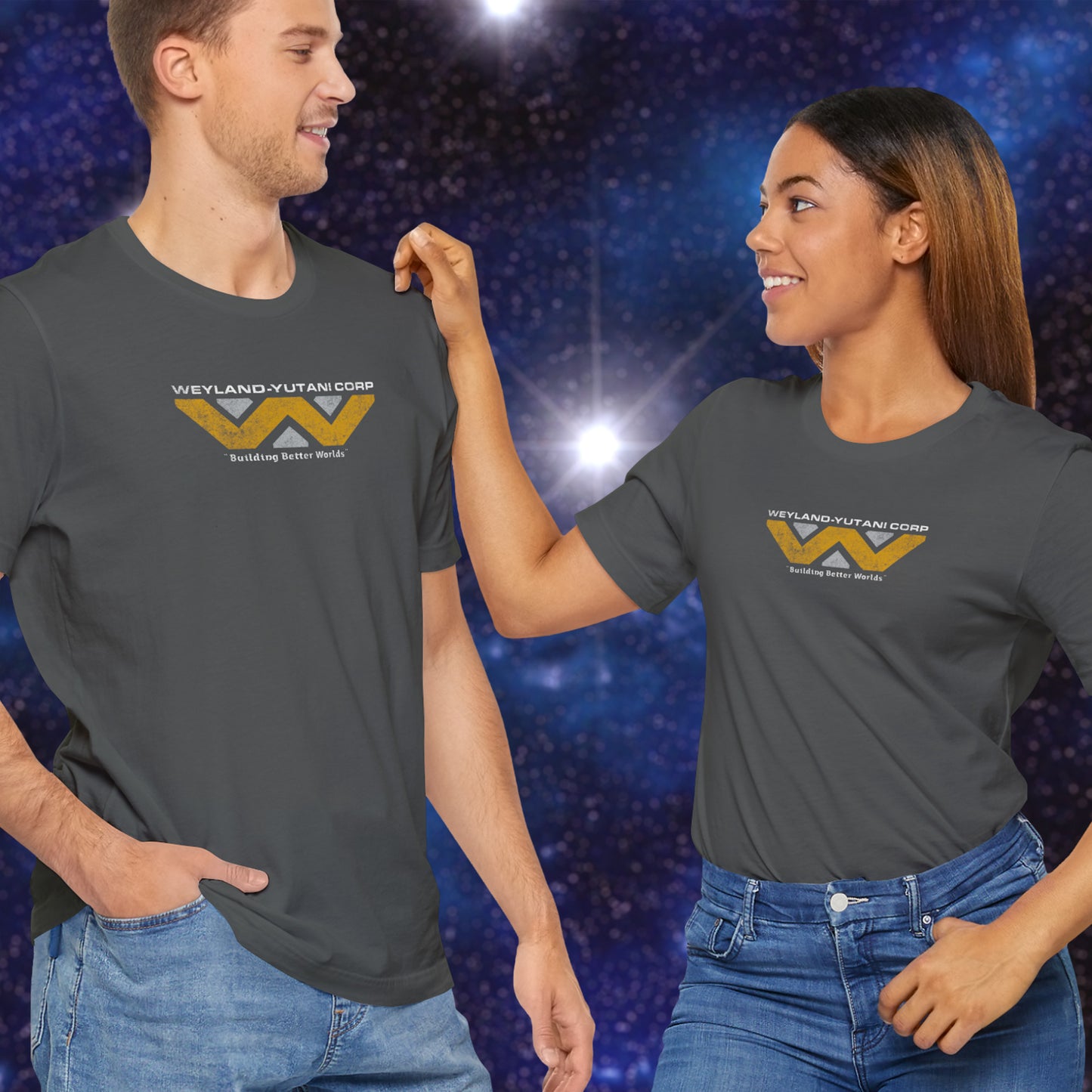 2 models wearing asphalt gray colored soft Bella+Canvas 3001 short-sleeve tee t-shirts featuring the Weyland-Yutani logo from the movie Alien and Aliens franchise in a vintage distressed style, sold by ScriptedBrand.