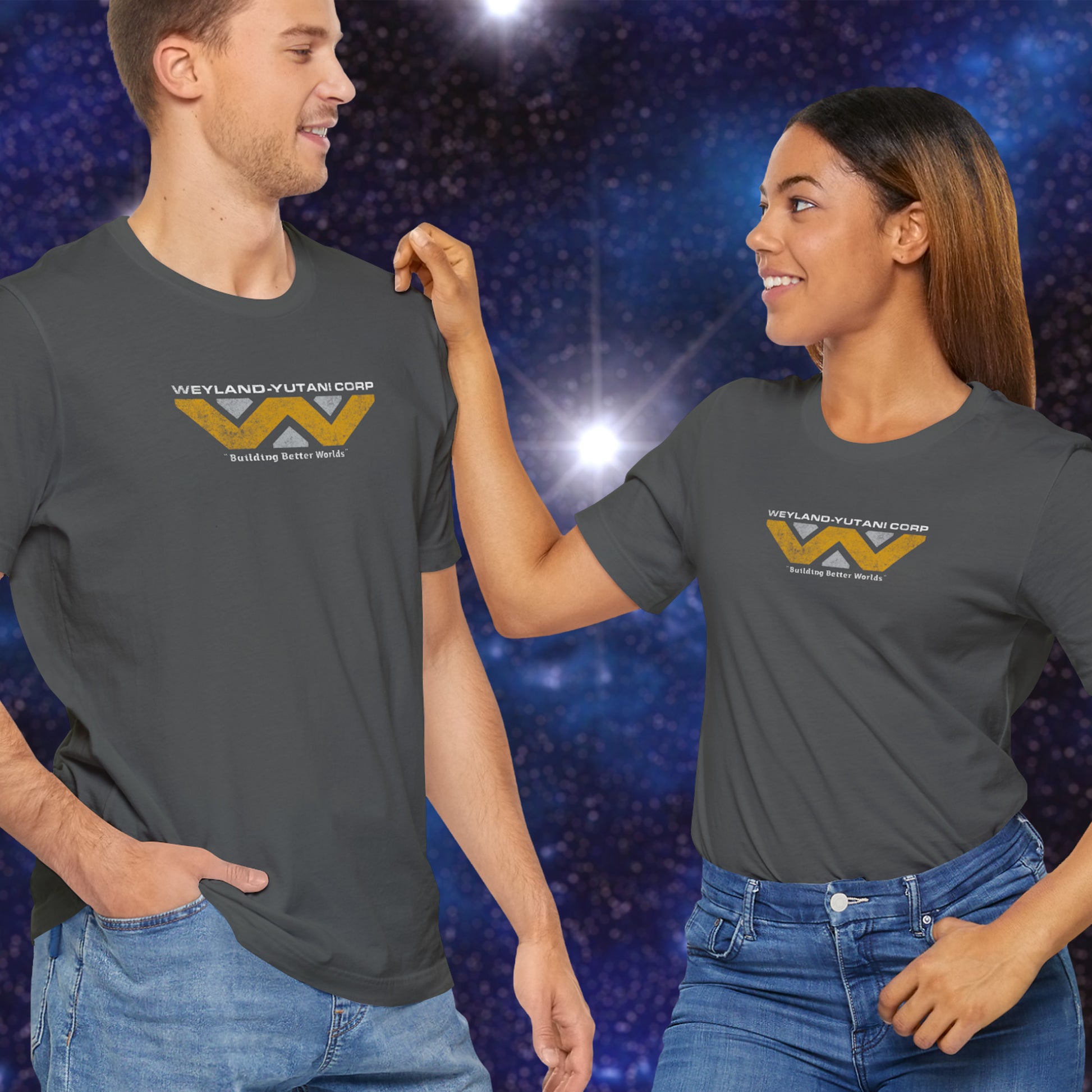 2 models wearing asphalt gray colored soft Bella+Canvas 3001 short-sleeve tee t-shirts featuring the Weyland-Yutani logo from the movie Alien and Aliens franchise in a vintage distressed style, sold by ScriptedBrand.