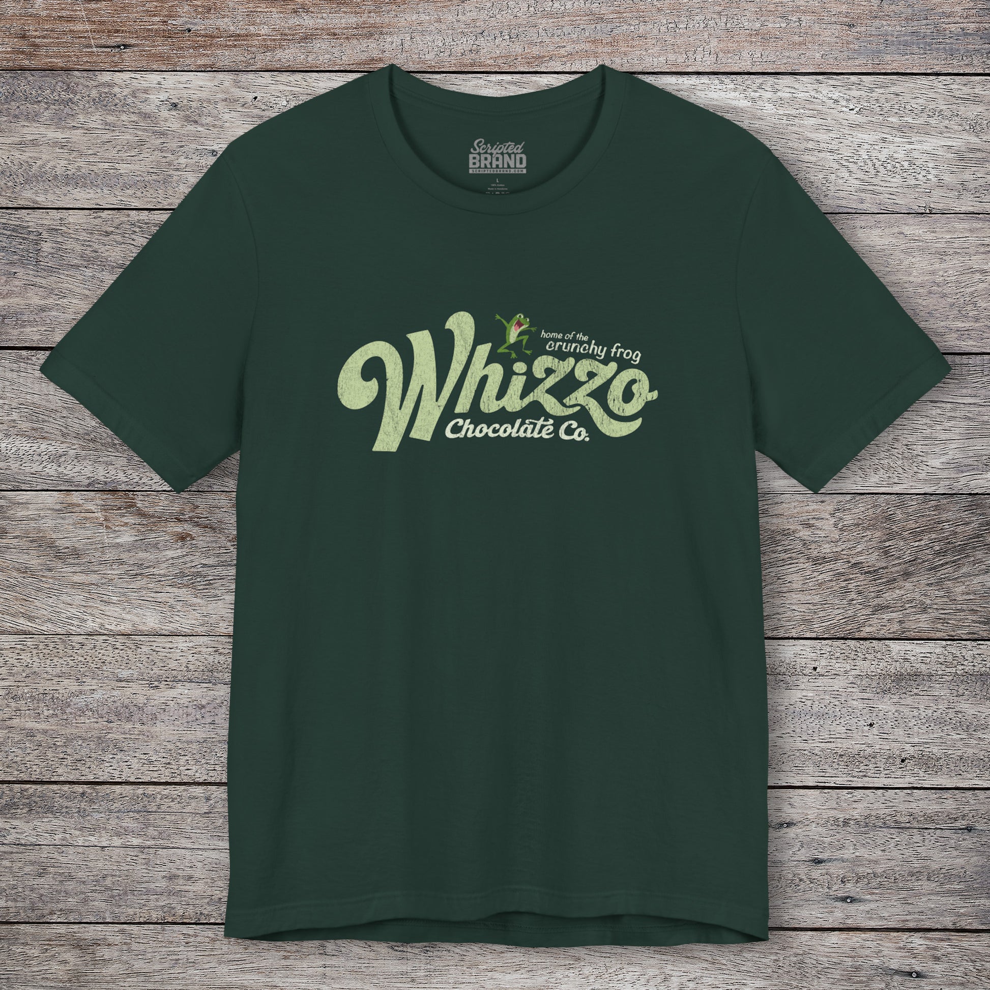 Forest green t-shirt with vintage Whizzo Chocolate Co. logo, inspired by Monty Python, featuring “home of the crunchy frog” graphic.