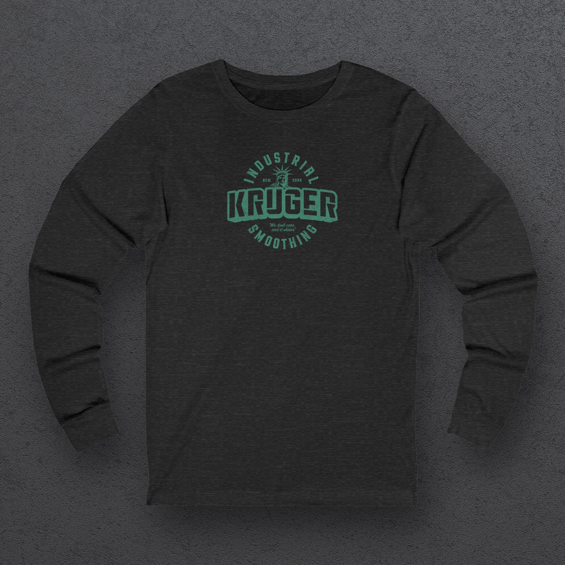 Front view of a deep heather colored soft unisex Bella+Canvas 3501 long-sleeve t-shirt featuring a Kruger Industrial Smoothing logo graphic, designed by ScriptedBrand in a vintage distressed style, and  inspired by the TV show Seinfeld. Includes the Statue of Liberty and the the slogan "We don't care and it shows".