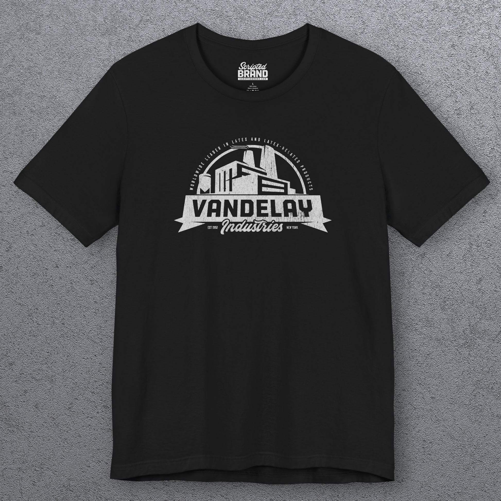 Front view of a black Soft Bella+Canvas 3001 short-sleeve t-shirt tee featuring a Vandelay Industries logo graphic, uniquely designed by ScriptedBrand in a vintage distressed style. The fictional company is part of the George Costanza storyline in the TV show Seinfeld. 