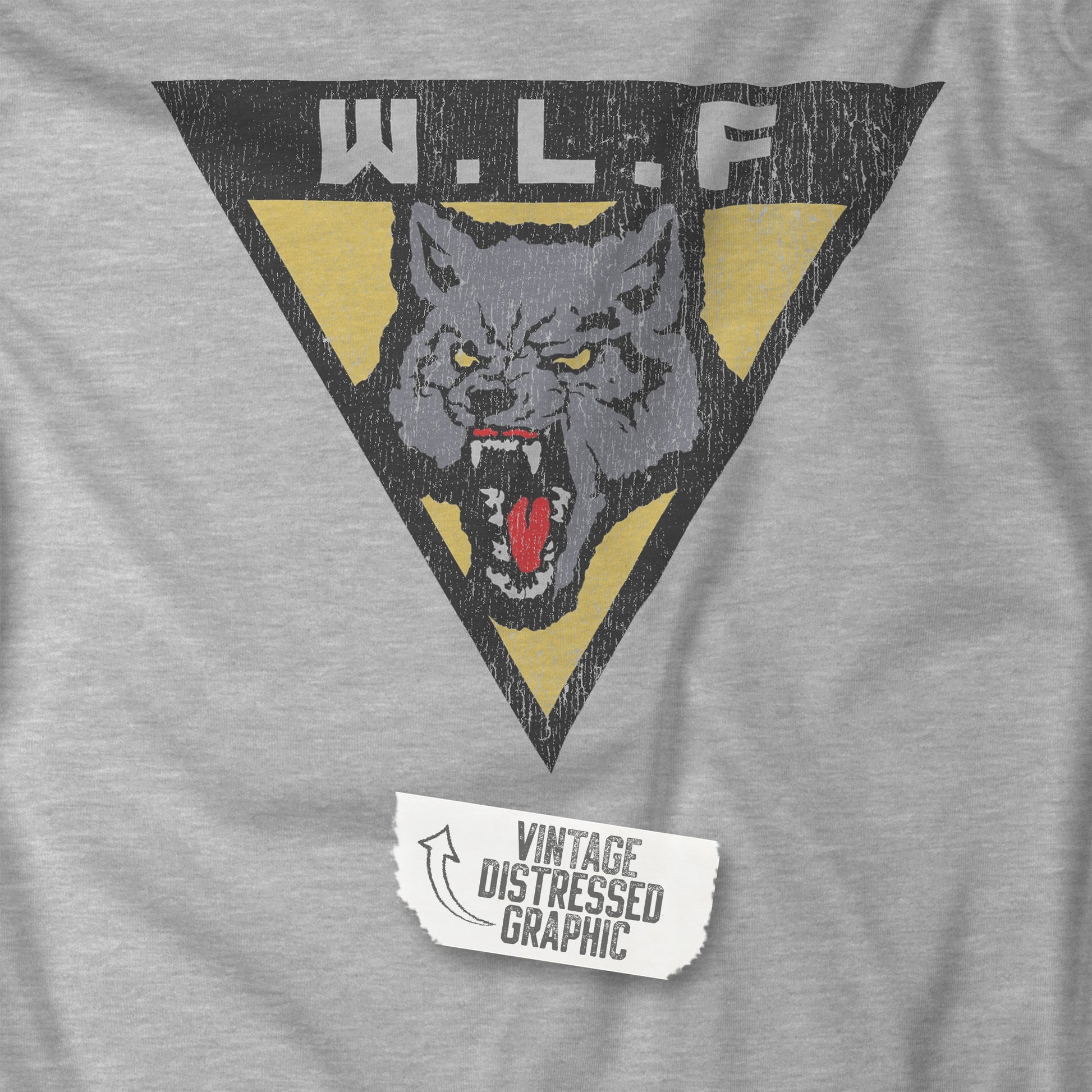 Closeup view of an athletic heather grey WLF t-shirt with distressed logo from The Last of Us