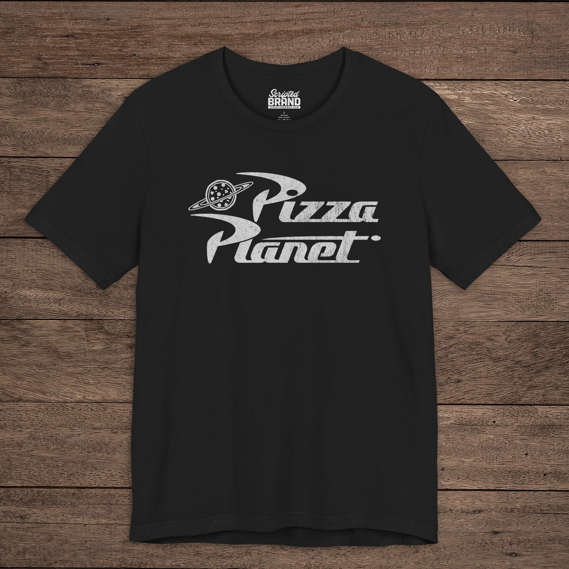 Front of black t-shirt with distressed white Pizza Planet logo inspired by the Toy Story movies.
