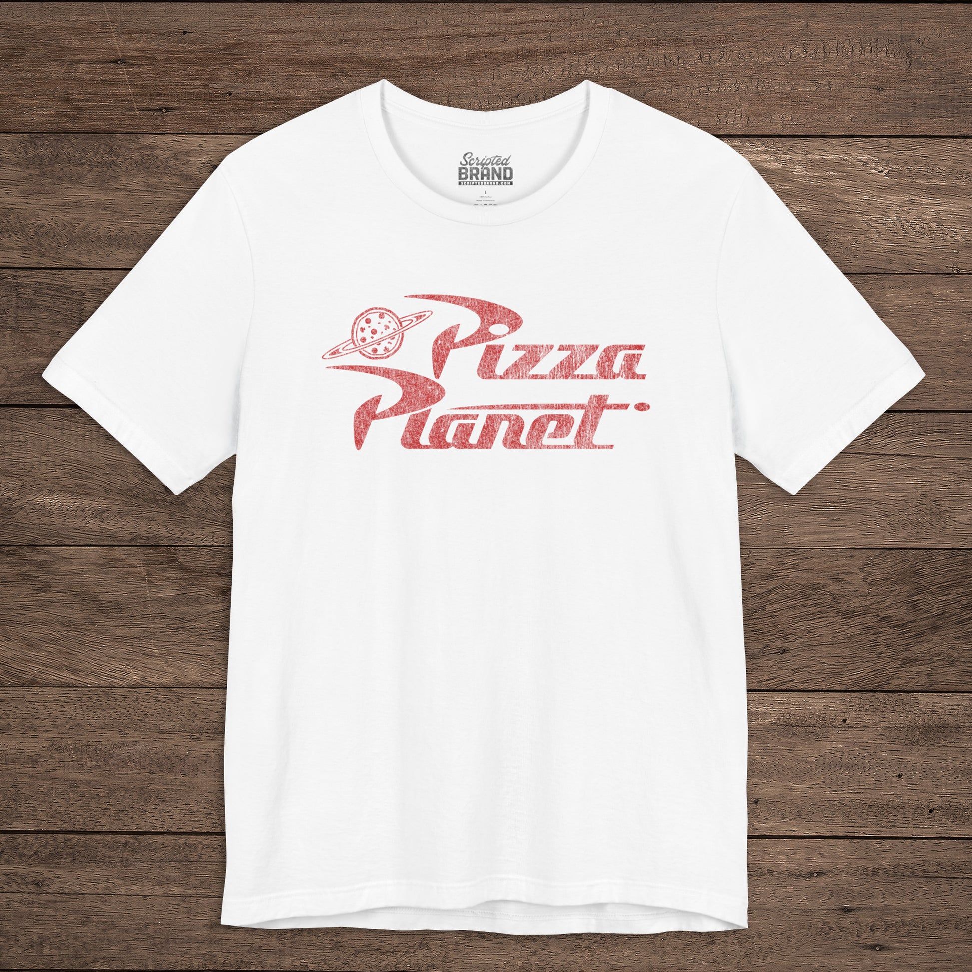 Front of white t-shirt with distressed red Pizza Planet logo inspired by the Toy Story movies.