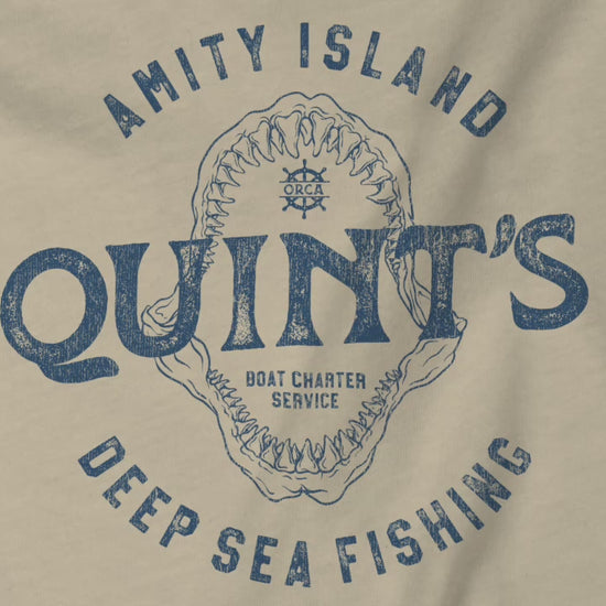 Video of sand colored sweatshirt with Quint's Deep Sea Fishing logo from the movie Jaws in vintage distressed style.