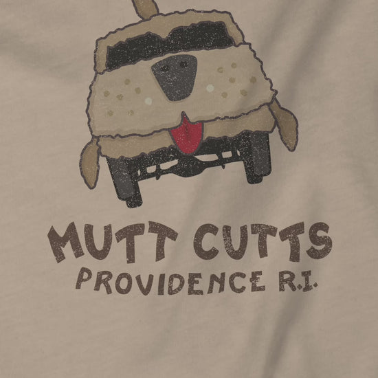Closeup video a Mutt Cutts logo graphic inspired by the movie Dumb and Dumber, illustrated by ScriptedBrand in a vintage distressed style.