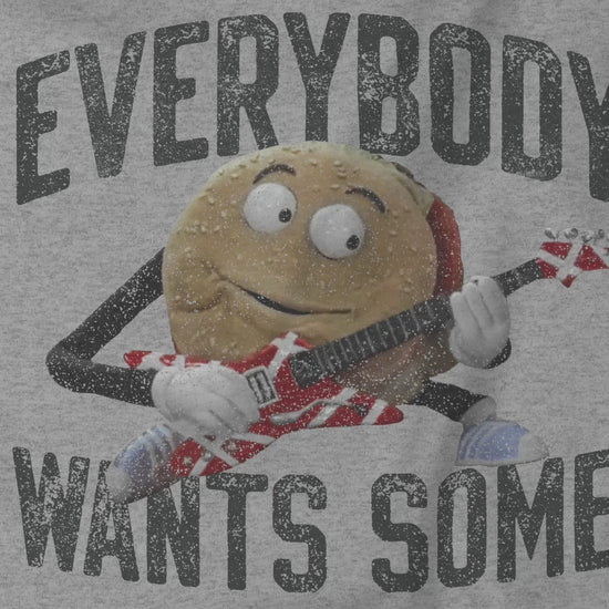Video of a graphic shirt featuring the phrase EVERYBODY WANTS SOME with a graphic of the Van Halen singing hamburger playing guitar from the movie Better Off Dead, designed by ScriptedBrand in a vintage distressed style.