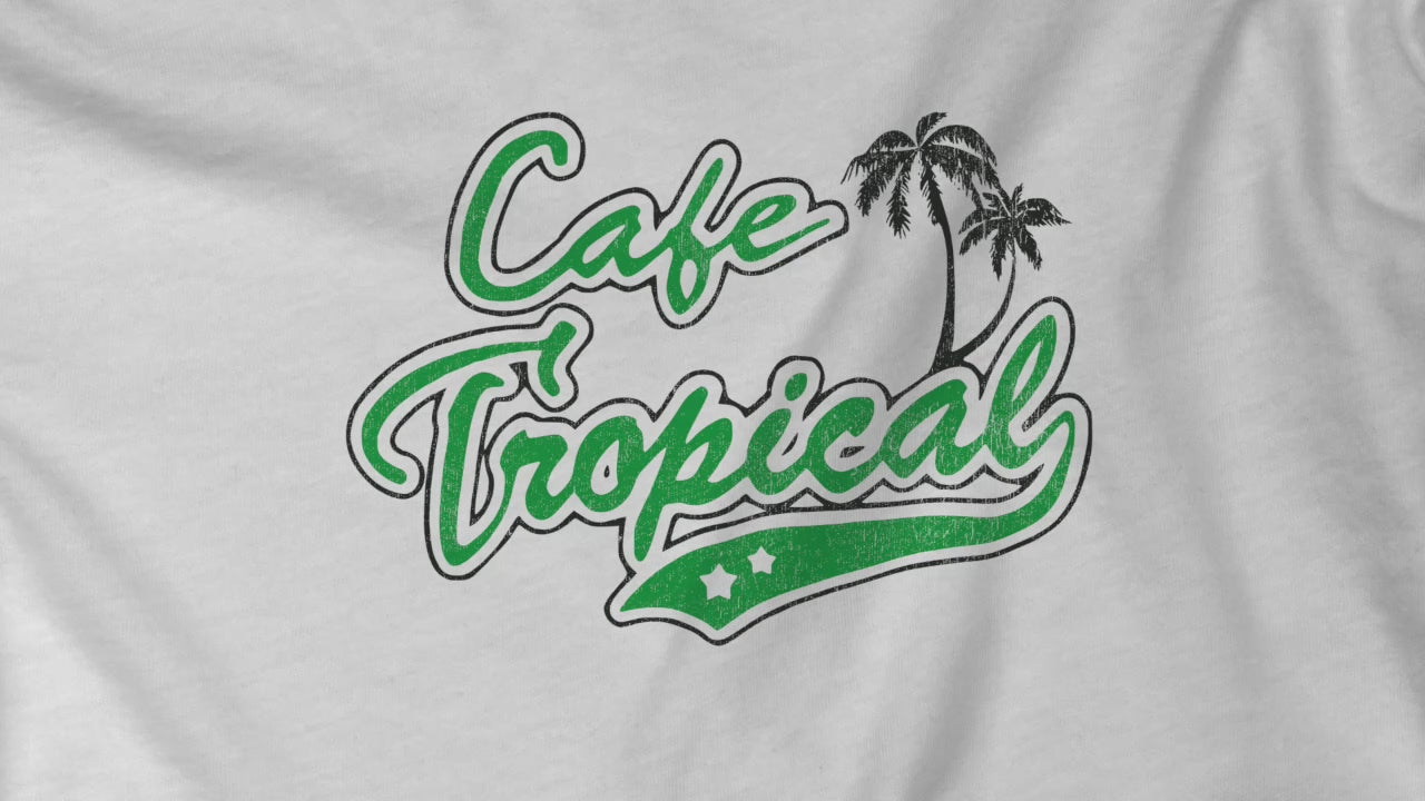 Video of a white and Green colored soft raglan 3/4 sleeve Tultex 245 baseball shirt featuring the fictional Cafe Tropical logo that David wore in the TV Show Schitts Creek in a vintage distressed style, sold by ScriptedBrand.