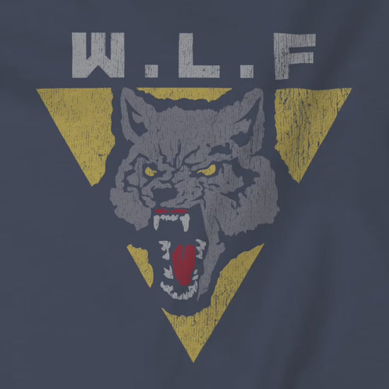 Video of t-shirts with distressed WLF logo from The Last of Us, featuring a snarling wolf inside a yellow triangle.