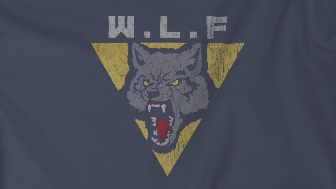 Video of t-shirts with distressed WLF logo from The Last of Us, featuring a snarling wolf inside a yellow triangle.