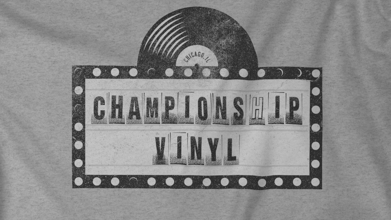 Video of t-shirts featuring the fictional logo CHAMPIONSHIP VINYL record store from movie High Fidelity in a vintage distressed style.