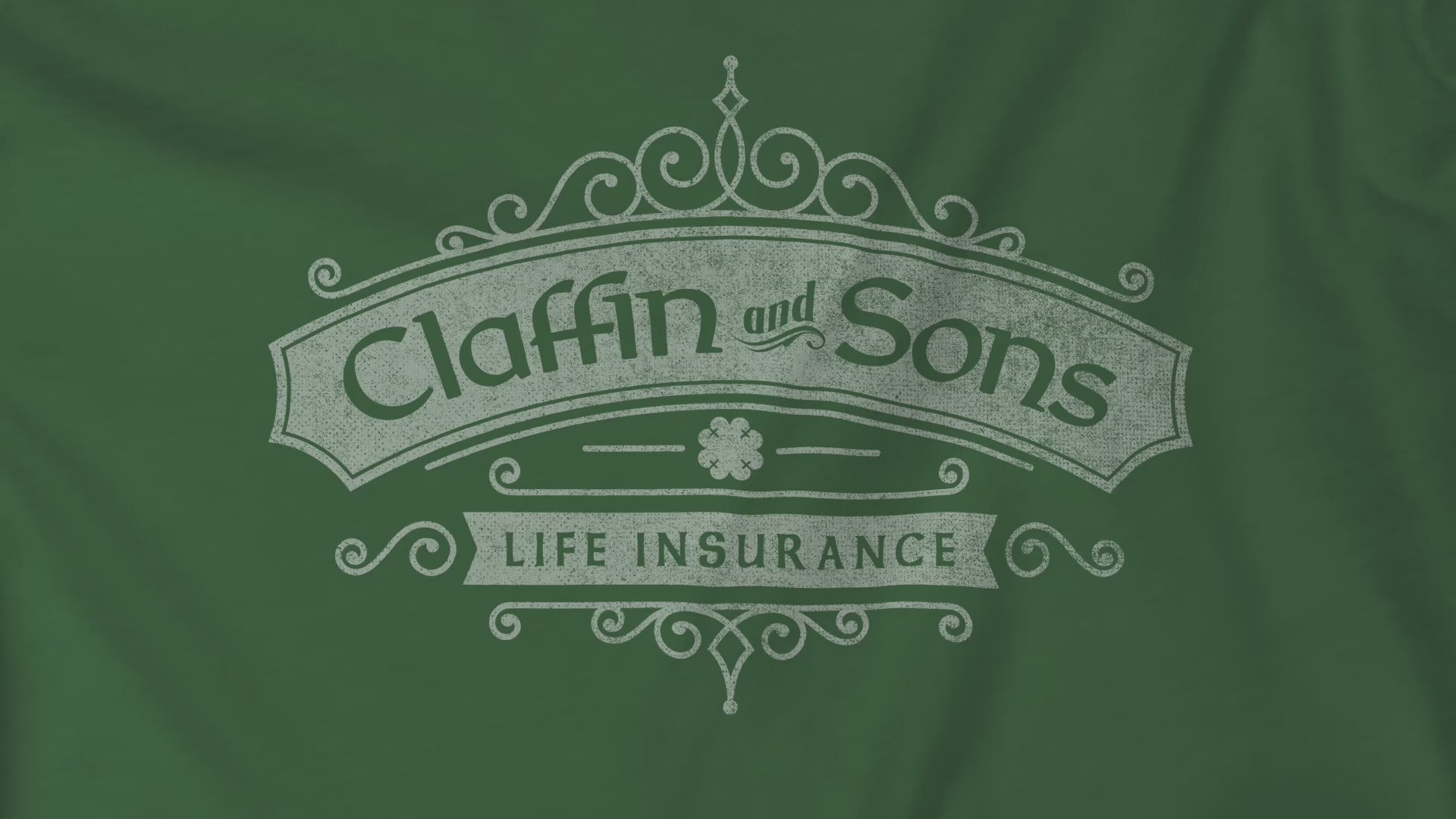 Video closeup of soft Bella+Canvas 3001 short-sleeve t-shirts featuring a logo graphic of Claffin & Sons Insurance, designed by ScriptedBrand in a vintage distressed vintage distressed style, inspired by the TV show Bad Sisters.