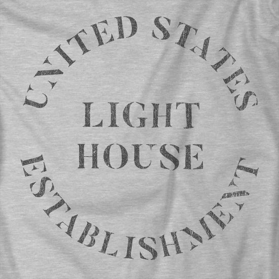 Video of t-shirt featuring the United States Light House Establishment logo graphic worn by Robert Pattinson in the movie The Lighthouse in a vintage distressed style.