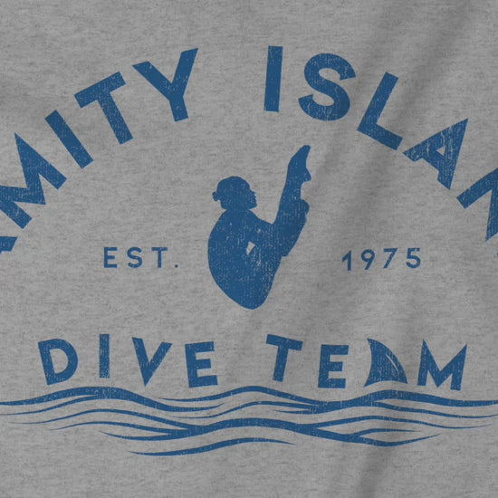 Video of heather grey Bella+Canvas t-shirt with vintage-style Amity Island Dive Team logo, inspired by the movie Jaws.