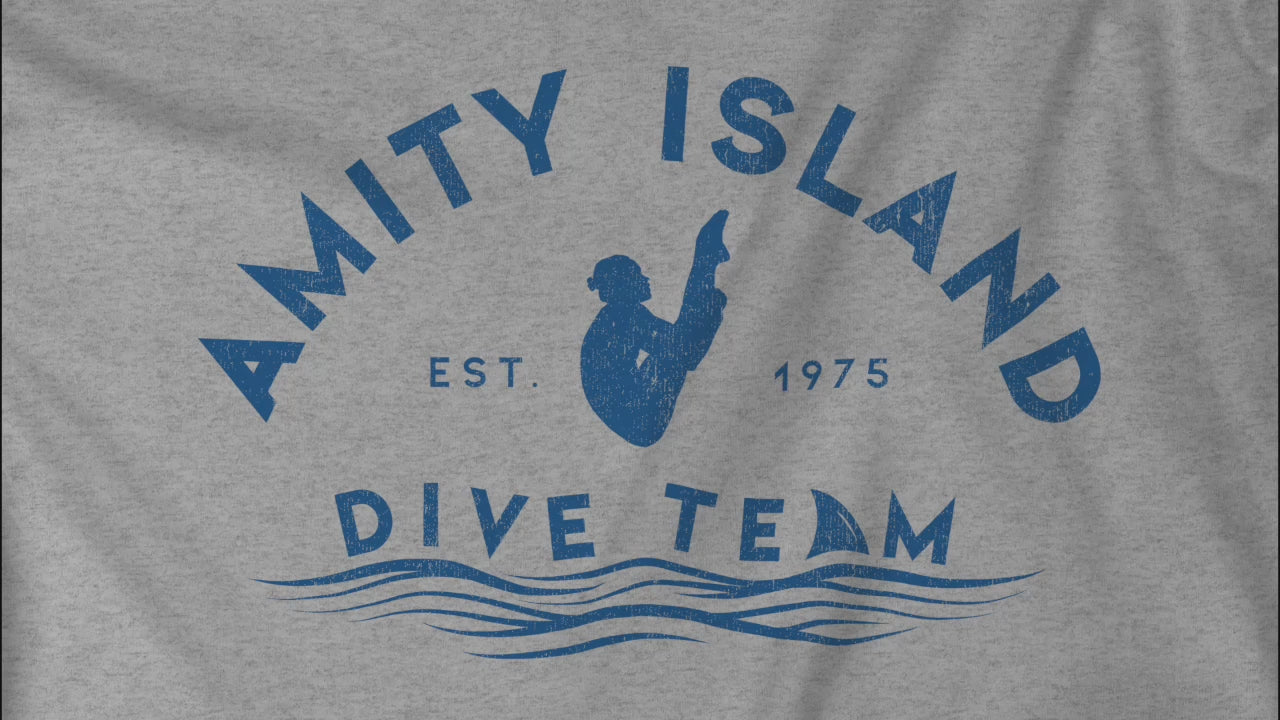 Video of heather grey Bella+Canvas t-shirt with vintage-style Amity Island Dive Team logo, inspired by the movie Jaws.